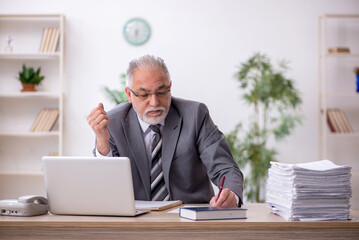 Old male employee and too much work in the office