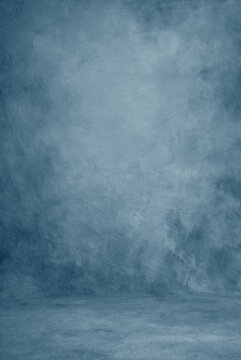 Classic blue photography studio portraiture cloth background or backdrop, beautiful paint strokes. 