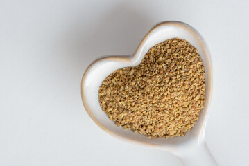 Anise Seeds on a Heart Shaped Spoon