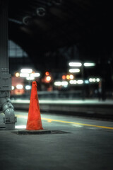 Closeup of a traffic cone on the road