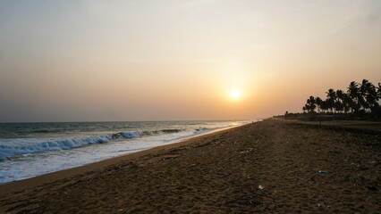 Scenic view of golden sunset by the beach 