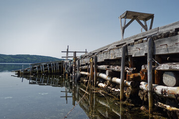 Old abandoned dock with codfish splitting table