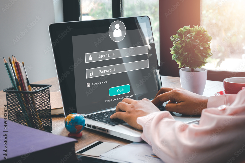 Aufkleber person hand typing on keyboard with login and password on screen display, cyber security concept, da