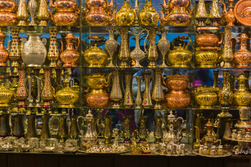 Copper vases for sale at the Grand Bazaar, Urumqi, Xinjiang, China