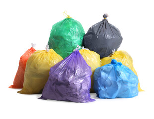 Trash bags full of garbage on white background