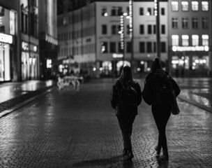 Couple walking during a rainy day in Leipzig, Germany