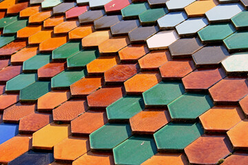 Closeup shot of colorful tile roof under a sunny day