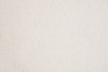 Horizontal beige canvas texture, closeup background.