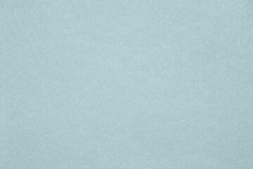 Horizontal blue green felt material texture background. Close up.