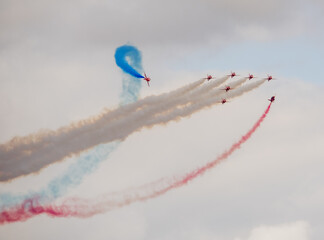 Beautiful shot of colorful smoke from air jets in the sky