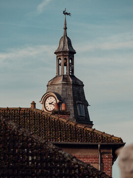 Vertical shot of the clocktower in Crecy La Chapelle, France