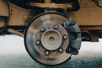 Disc brakes of old cars, vans with broken tires parked on the side of the road to change tires at a rural garage © SuperMoo Varavut
