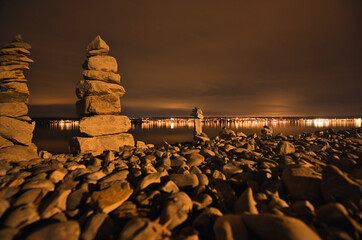 Beautiful night view of the beach of  Lake Constance with long exposure and lights