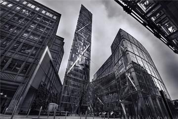 Grayscale shot of skyscrapers in London, UK