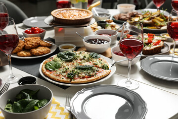 Brunch table setting with different delicious food indoors