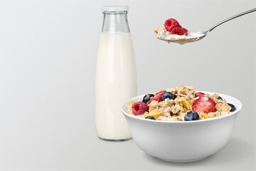 The concept of a healthy breakfast of vegetarian yogurt and fresh fruit on a table