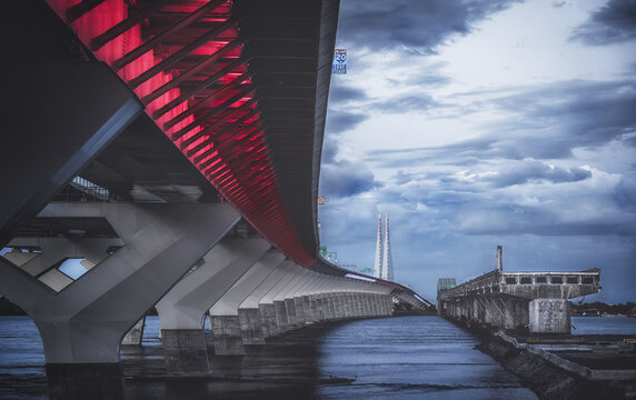 Closeup of a glass Champlain bridge above the water