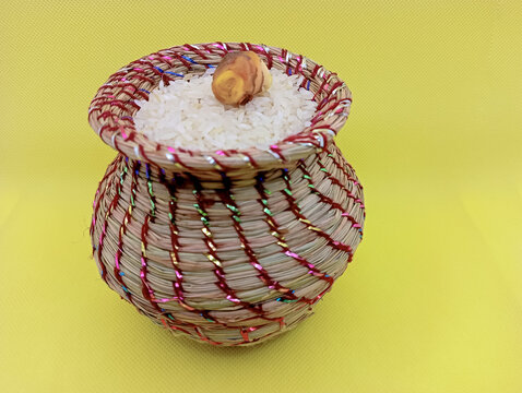 Kusha grass made pot with rice and ginger
