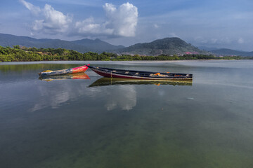 Beautiful view of River two beach with boats in Sierra Leone on a sunny day