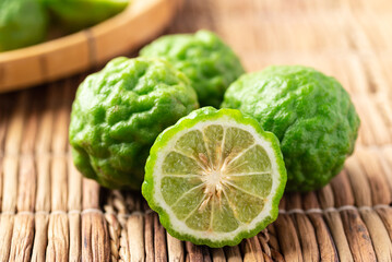 Organic Kaffir lime, Citrus fruit used in Southeast Asian cuisine and essential oil