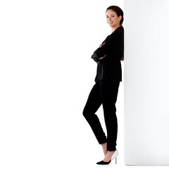 All about that ambition. Studio portrait of a successful young businesswoman leaning against a wall.