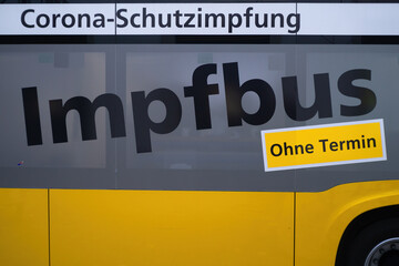 In a yellow vaccination bus medical staff gave people the vaccinations