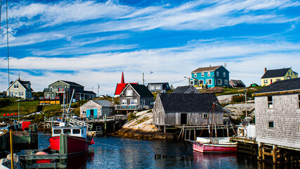 Beautiful view of old cottages and fishing boats in Peggy's Cove, Nova Scotia - obrazy, fototapety, plakaty