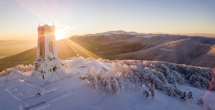 Tranquil landscape of the snow covered Shipka Peak in Bulgaria at sunset