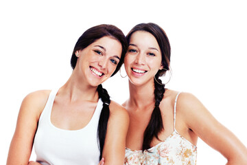 Best friends for life. Two happy teen girlfriends posing for the camera, isolated on white - copyspace.