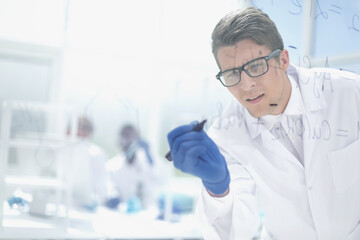 background image.attentive scientist working in the laboratory.