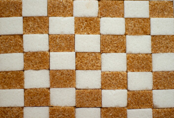 коричневый тростниковый сахар  разложен в шахматном порядке с белым