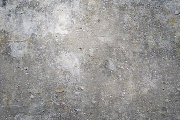 Dirty rough concrete floor with paint dot.