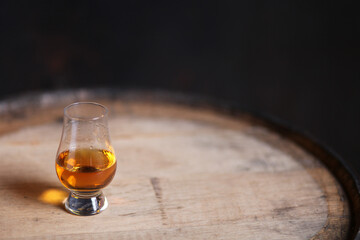 Glencairn glass on whiskey barrel