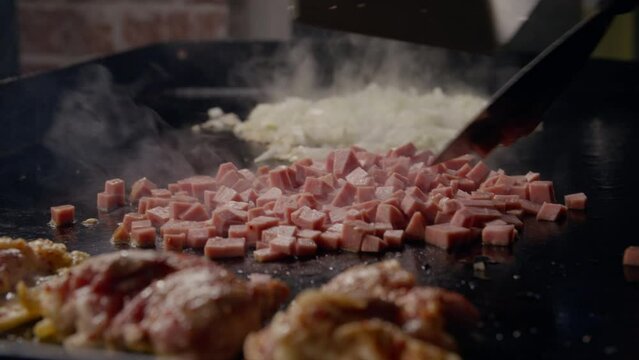 Cooking Spam on Flat Top.