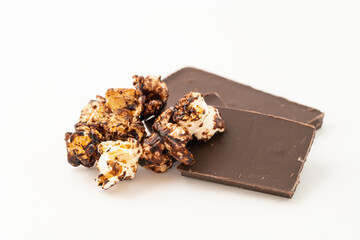 Chocolate caramel popcorn on a solid background
