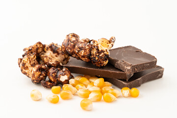 Chocolate caramel popcorn on a solid background