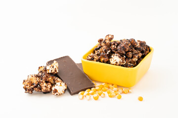 Chocolate caramel popcorn on a solid background