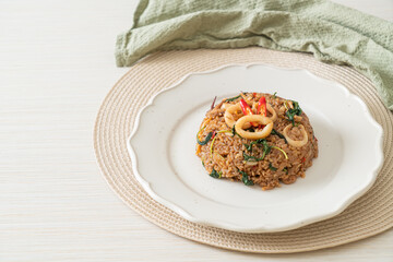 fried rice with squid and basil in Thai style
