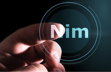 Hand pressing Nim button on virtual screen. Nim programming language.