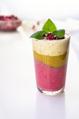 Delicious layered yogurt dessert with applesauce, raspberries and banana.