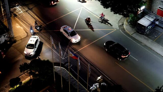 Evening traffic at an intersection somewhere in uptown Cebu City, Philippines.