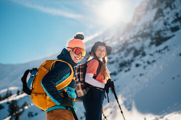 Mountaineer backcountry ski walking ski alpinist in the mountains. Ski touring in alpine landscape...