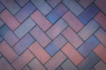 Lovely multi-colored paving slab background. View from above. Multicolor bricks and paving stones. Top view