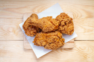 Fried chicken Crispy Chicken on wooden background.  