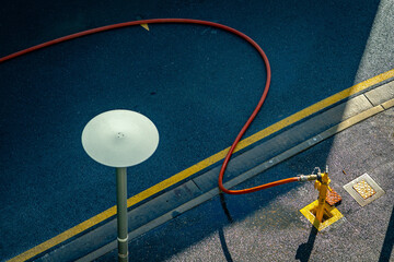 Hose connected to a fire hydrant on the street