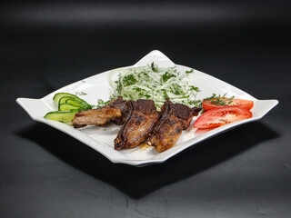 Grilled lamb chops served onion