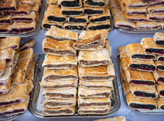 Heap of delicoius strudel stuffed with poppy apfel and cherry