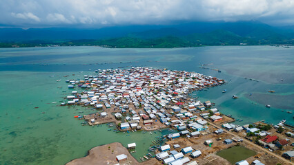 Fototapeta premium Aerial shot of Bungin island is the MOST POPULATED Island in the world after Earthquake 7.0 M Lombok