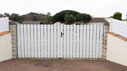 high gate suburb white house gate with slats