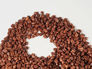 Coffee beans isolated on white background with copyspace for text. Coffee background or texture concept.